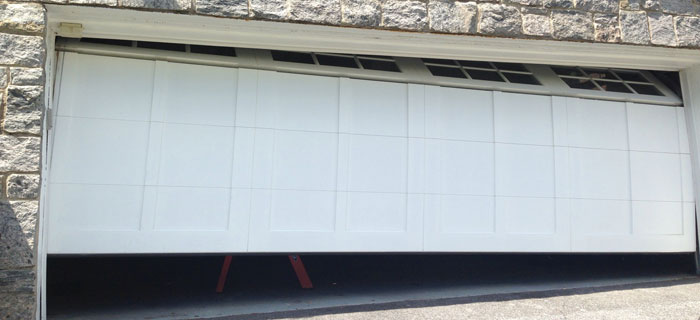 Broken garage door Cos Cob CT 06807